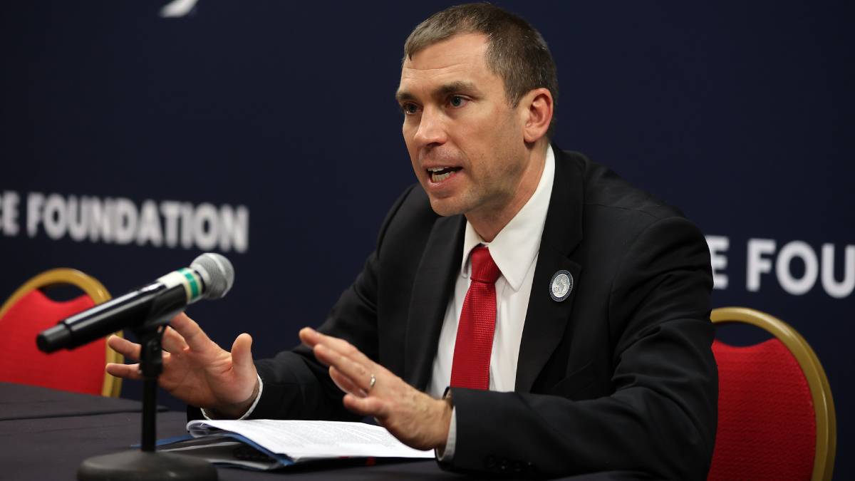 Derek Tournear, Director of the U.S. Space Force's Space Development Agency, gestures while speaking at a podium during the Space Symposium in Colorado Springs, Colorado.