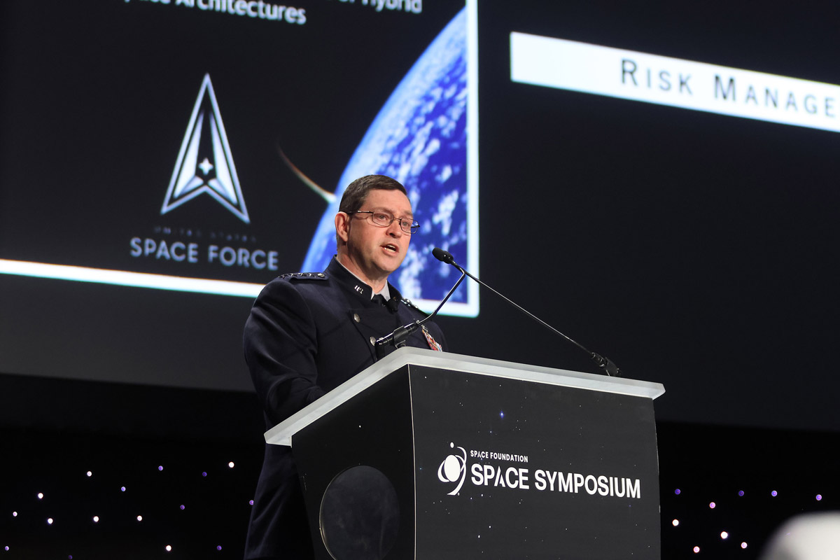 U.S. Space Force Chief of Space Operations Chance Saltzman speaks at the podium during the 39th Space Symposium in Colorado Springs, Colorado.