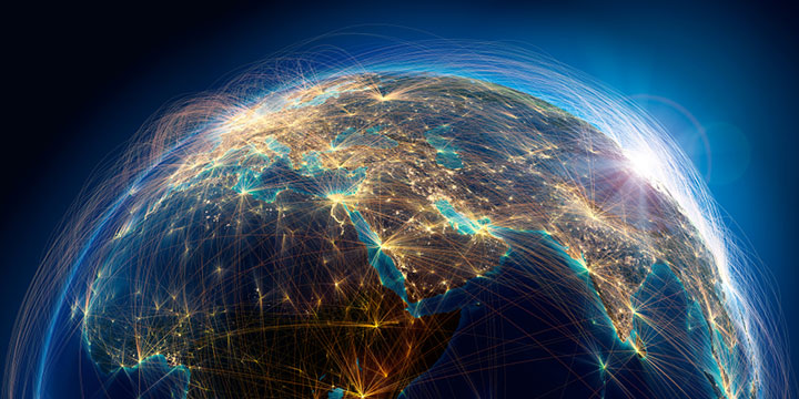 Digital visualization of Planet Earth focusing on the Middle East, with intricate, glowing network lines representing air traffic routes based on real-world data. The continents are depicted with detailed topography and bright network connections, symbolizing global connectivity. The image has a deep blue background, suggestive of outer space. This is a 3D rendering illustration.