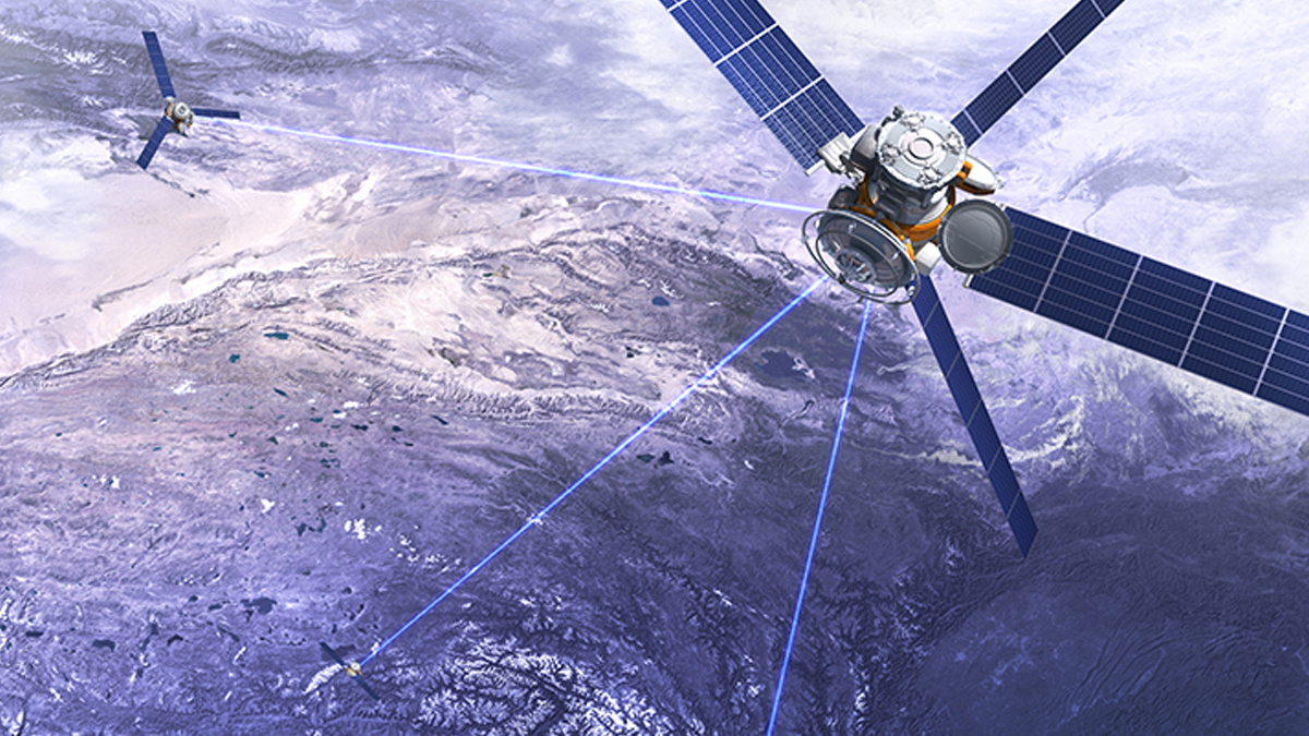 Two communication satellites in orbit above Earth, transmitting data between each other and the ground using blue laser beams.
