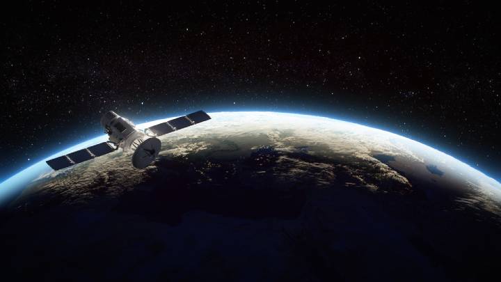 Satellite in space orbiting Earth