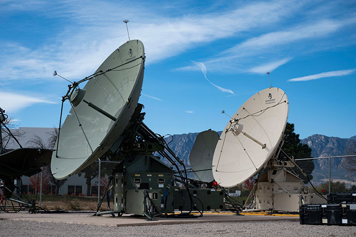 This Nov. 2, 2022, photo shows the Quad-band Large Aperture Antenna (QLAA) and Ground Multi-band Terminal (GMT) satellite dishes used by the U.S. Space Force.