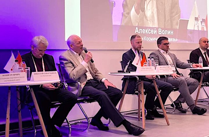 Alexey Volin, general director of Russian Satellite Communications Co., RSCC, seated second from left