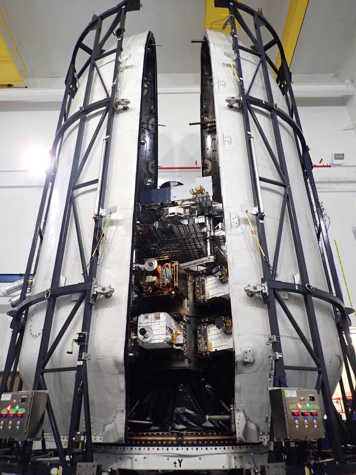 SDA Tranche 0 satellites being encapsulated inside a SpaceX Falcon 9 fairing.