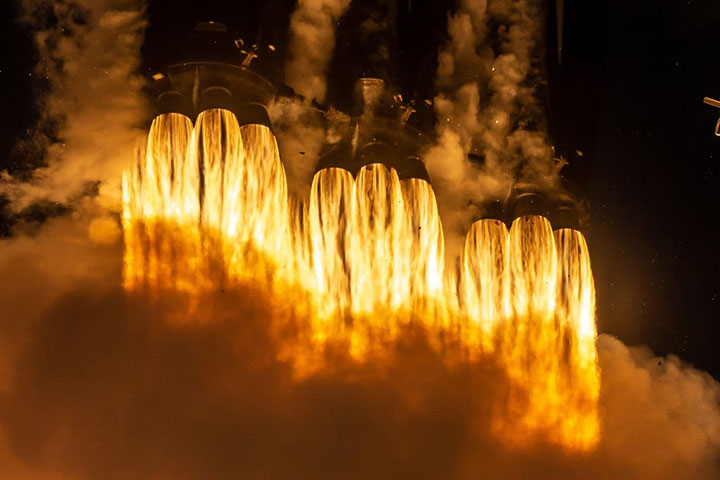 A Falcon Heavy rocket lifts off.