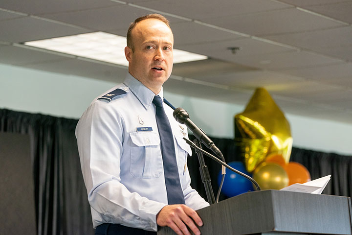 Col. Richard Kniseley addresses an audience of industry and government attendees at the grand opening of the COSMIC facility in Chantilly, Va. On June 6, 2023.