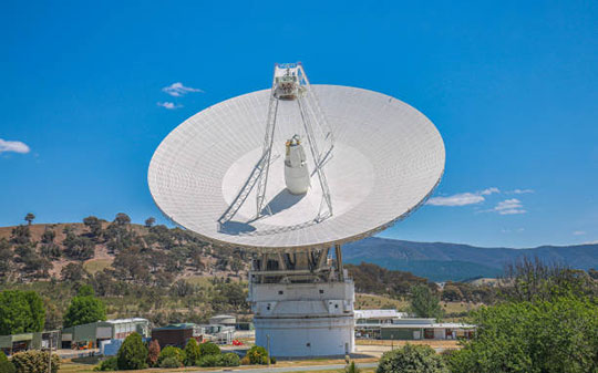 Front view of a big dish antenna called Deep Space Station 43 (70-metre) at the Canberra Deep Space Communication Complex